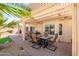 Charming outdoor patio with a pergola, perfect for relaxing or entertaining with desert landscaping at 15770 W Remington Dr, Surprise, AZ 85374