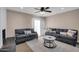 Spacious living room with neutral colors, comfortable seating, and sliding glass doors for natural light at 16041 N 31St St # 21, Phoenix, AZ 85032