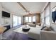 Cozy living room features a fireplace, sliding glass doors, and comfortable seating at 17200 W Bell Rd # 2162, Surprise, AZ 85374