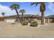 Beautiful home featuring desert landscaping, solar panels, and a spacious two-car garage at 17410 N Conquistador Dr, Sun City West, AZ 85375