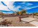 Expansive backyard with desert landscaping offers a serene outdoor space at 17815 W Calistoga Dr, Surprise, AZ 85387