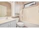 Cozy bathroom with shower-tub, a toilet, and white vanity with storage at 17815 W Calistoga Dr, Surprise, AZ 85387