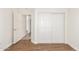Bedroom showcases an open closet and modern flooring at 17815 W Calistoga Dr, Surprise, AZ 85387