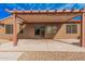 Covered patio offering outdoor space, a gravel area, and block walls at 17815 W Calistoga Dr, Surprise, AZ 85387