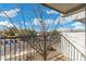 Outdoor balcony with metal railing, offering a nice view of the street and blue sky at 18239 N 40Th St # 107, Phoenix, AZ 85032