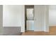 A laundry room with stacked washer and dryer in hallway closet at 18239 N 40Th St # 107, Phoenix, AZ 85032