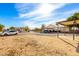 Wide open property with long driveway and covered parking at 19412 W Clarendon Ave, Litchfield Park, AZ 85340