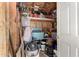 Storage shed filled with tools and supplies with a well-lit interior at 19412 W Clarendon Ave, Litchfield Park, AZ 85340