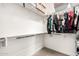 Walk-in closet with ample shelving and hanging space for optimal organization at 2065 N Red Clf, Mesa, AZ 85207