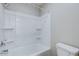 Bathroom features a clean, white shower-tub combo and a white toilet at 2146 W Isabella Ave # 215, Mesa, AZ 85202