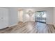 Bright living room with wood flooring and access to the outdoor at 2146 W Isabella Ave # 215, Mesa, AZ 85202
