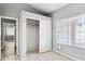 Bedroom featuring a closet, a window, and neutral color palette at 30663 N 44Th St, Cave Creek, AZ 85331