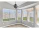 Cozy dining area with large windows and views of the backyard at 30663 N 44Th St, Cave Creek, AZ 85331