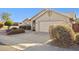 A well maintained house with a two car garage and desert landscaping at 30663 N 44Th St, Cave Creek, AZ 85331