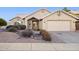 Charming front yard with desert landscaping and a well-maintained exterior at 30663 N 44Th St, Cave Creek, AZ 85331