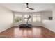 Bright bonus room with wood-look tile floor and backyard neighborhood views at 408 E Silverwood Dr, Phoenix, AZ 85048