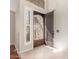 Welcoming entryway with tile flooring and an decorative iron door at 408 E Silverwood Dr, Phoenix, AZ 85048