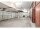 Spacious garage with ample storage and custom racks; perfect for organizing tools and equipment at 408 E Silverwood Dr, Phoenix, AZ 85048