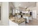 Kitchen with granite countertops, stainless steel appliances, an undermount sink, and white cabinetry at 408 E Silverwood Dr, Phoenix, AZ 85048