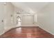 Spacious living room with wood floors, and a view of adjoining living spaces at 408 E Silverwood Dr, Phoenix, AZ 85048