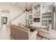 Open living area with high ceilings, built-in shelving, and natural light at 408 E Silverwood Dr, Phoenix, AZ 85048