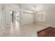 Inviting living room featuring tile and wood flooring with backyard views at 408 E Silverwood Dr, Phoenix, AZ 85048