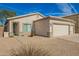 Charming single-story home with a well-maintained front yard and two car garage at 502 E Mountain View Rd, San Tan Valley, AZ 85143