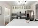 Modern kitchen featuring a large island, stainless steel appliances, and stylish cabinetry at 502 E Mountain View Rd, San Tan Valley, AZ 85143