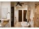 Luxurious bathroom with double vanities, freestanding tub, and a seamless glass shower at 6115 E Calle Del Norte --, Scottsdale, AZ 85251