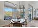 Open dining area with mountain views and a stylish light fixture at 6426 N 27Th St, Phoenix, AZ 85016