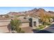 Beautiful desert home with mountain views, stone accents, and a secure gated entrance to the courtyard at 6426 N 27Th St, Phoenix, AZ 85016