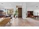 Spacious foyer with flagstone flooring, high ceilings, and natural light from large windows at 6426 N 27Th St, Phoenix, AZ 85016