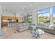 Open floor plan seamlessly connects living room, kitchen, and dining area with natural light at 6426 N 27Th St, Phoenix, AZ 85016