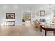 Open living area featuring flagstone floors, a fireplace, and a view of the backyard at 6426 N 27Th St, Phoenix, AZ 85016