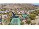 Aerial view of community tennis courts with lush landscaping and mountain views at 6426 N 27Th St, Phoenix, AZ 85016
