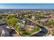 A planned community features a sports field, a tennis court, playground, and a common grassy area at 6960 E Ivyglen St, Mesa, AZ 85207