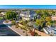 Luxury home with a pristine pool, lush landscaping, and an inviting outdoor space at 6960 E Ivyglen St, Mesa, AZ 85207