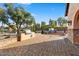 Neighborhood community barbecue area with brick paving and built-in grilling station at 6960 E Ivyglen St, Mesa, AZ 85207