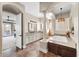Luxurious bathroom featuring a soaking tub and a dual vanity at 6960 E Ivyglen St, Mesa, AZ 85207