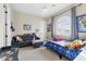 bedroom with a themed bed, couch, and window, creating a playful and inviting space at 6960 E Ivyglen St, Mesa, AZ 85207
