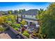 Stunning backyard view of this home, showcasing a private balcony, pool, and covered patio at 6960 E Ivyglen St, Mesa, AZ 85207