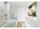 Modern bathroom featuring a glass shower, marble finishes, and dual sink vanity at 7161 E Rancho Vista Dr # 1011, Scottsdale, AZ 85251