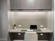 Clean desk space with built-in storage and modern decor, perfect for productivity and organization at 7161 E Rancho Vista Dr # 1011, Scottsdale, AZ 85251