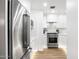 Contemporary kitchen featuring stainless steel refrigerator and modern appliances, blending style with functionality at 7161 E Rancho Vista Dr # 1011, Scottsdale, AZ 85251