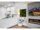 Bright kitchen has stainless steel appliances, marble countertops, and stylish contemporary décor at 7161 E Rancho Vista Dr # 1011, Scottsdale, AZ 85251