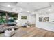 Open-concept living area with kitchen, dining nook, and spacious living room bathed in natural light at 7161 E Rancho Vista Dr # 1011, Scottsdale, AZ 85251