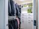 Walk-in closet with ample storage and shelves for personal belongings at 7161 E Rancho Vista Dr # 1011, Scottsdale, AZ 85251