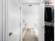 Walk-in closet with a full bathroom, shower, and lots of storage space at 7161 E Rancho Vista Dr # 1011, Scottsdale, AZ 85251