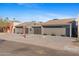 Street view of modern home featuring xeriscape and updated exterior at 7528 E 1St St, Scottsdale, AZ 85251