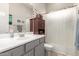 This bathroom features a vanity area with good lighting and a shower and bathtub combo at 7533 S Woodchute Dr, Gold Canyon, AZ 85118